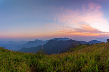 Obraz premium Mountain valley during sunrise. Natural summer landscape