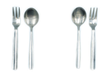 Spoons and forks on a white background