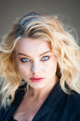 Fototapeta premium Perfect blonde woman with professional make up and hair