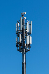 Fototapeta na wymiar Telecommunication tower of 5G cellular mobile radio antenna. Radio tower.