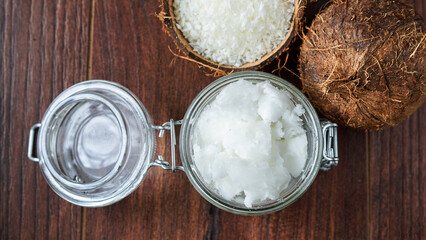 coconut butter and flakes on wooden background