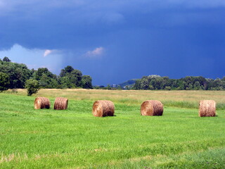Summer Hay Bales and Thunderstorm in Upstate New York