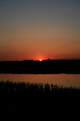 Sunset on the Biebrza river in Biebrza National Park, Poland