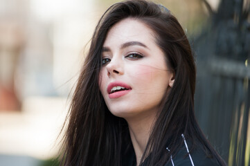 Obraz premium Portrait of beautiful young woman with makeup 