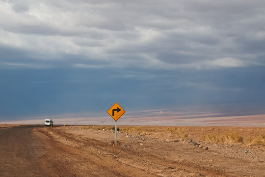 Road sign right turn in desert