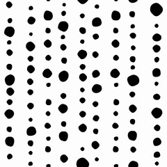 Seamless abstract pattern of little black shabby dots or spots on white.
