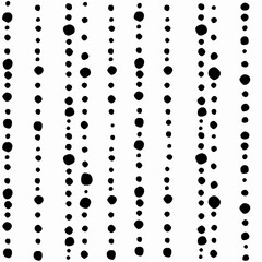 Seamless abstract pattern of little black shabby dots or spots on white.