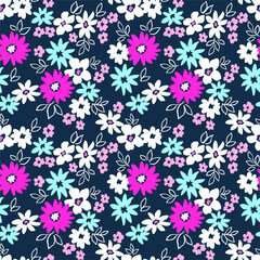 Elegant floral pattern in small white, blue and pink flowers. Liberty style. Floral seamless background for fashion prints. Ditsy print. Seamless vector texture. Spring bouquet.