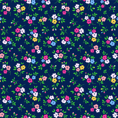 Fototapeta na wymiar Vintage floral background. Seamless vector pattern for design and fashion prints. Flowers pattern with small colorful flowers on a navy blue background. Ditsy style.