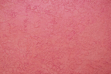 Background with pink decorative plaster