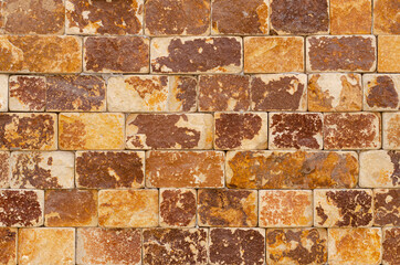 Background image of a colored stone wall