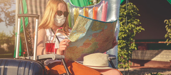 Staycations,Social distance. gen z travels alone suitcase to the covid 19 coronavirus pandemic, isolation, tourism,new normal.Staycations, hyper-local travel, Road trip,getaway, natural environment