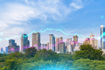 Obraz premium Forex and stock market chart hologram over panorama city view of Bangkok, the financial center in Asia. The concept of international trading. Double exposure.