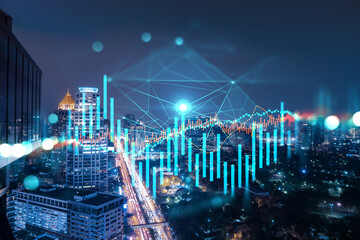 FOREX graph hologram, aerial night panoramic cityscape of Bangkok, the developed location for stock market researchers in Asia. The concept of fundamental analysis. Double exposure.