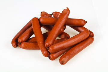 Tasty meat sausages over white background