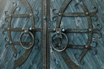 Fotobehang Forged round door handles in retro style © Vadym