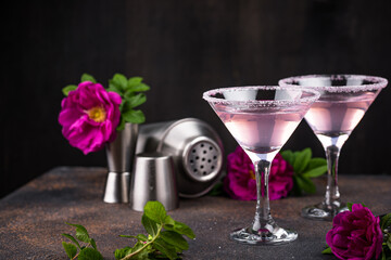 Pink martini cocktail with rose syrup