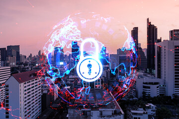 Hologram of Padlock on sunset panoramic cityscape of Bangkok, Asia. The concept of cyber security intelligence. Multi exposure.