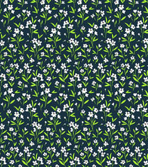 Vector seamless pattern. Pretty pattern in small flower. Small white flowers. Dark green background. Ditsy floral background. The elegant the template for fashion prints.