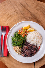 Typical Brazilian dish called Feijoada. Made with black beans, pork and sausage