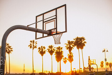 basketball hoop overlooking the sunset on the beach in California © Anna