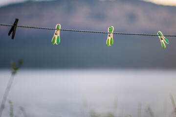 Green Clothespins on empty clothesline
