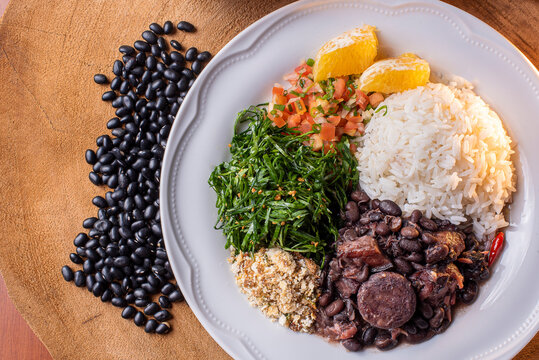 Typical Brazilian dish called Feijoada. Made with black beans, pork and sausage