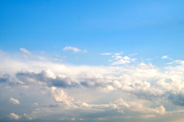 bright sky with pink and white clouds for background