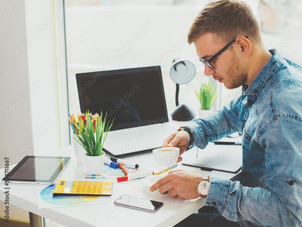 Poster web designer working on the best framework of a new application