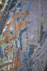 Textured background of paint in cold tone, selective focus