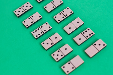 vintage old white Domino on a green background