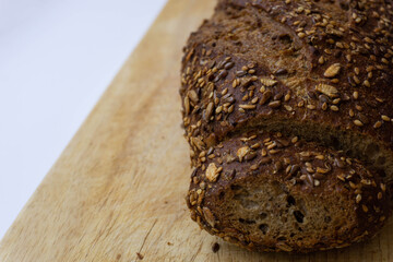 Integral bread detail. Healthy food concept. Entire bread cut on slices.