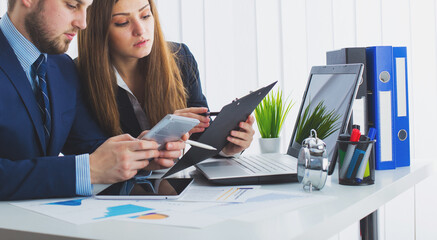 Businessman And Businesswoman Meeting In Modern Office