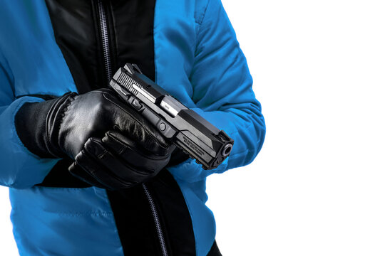 man in a blue jacket and black gloves holds a gun in his hands on a white background