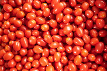 Lots of red, tasty and fresh tomatoes. Healthy food