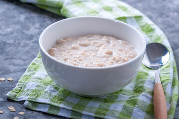 Oatmeal with fruits. Healthy food for breakfast. Dietary food