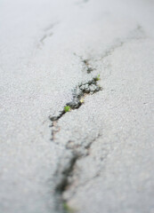 broken asphalt road close up 