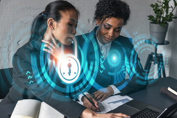 Two businesswomen work together in modern office on new project. Double exposure. Concept of...