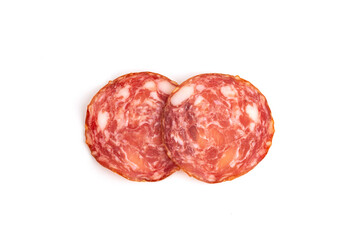 Two appetite slices of raw smoked sausage salami on white isolated background
