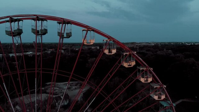 Ferris Wheel in Abandoned Amusement Park, Close Up Drone Aerial View, Spreepark, East Berlin, Germany