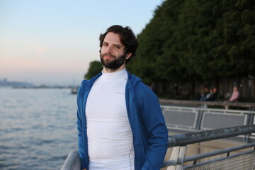 young, beach, portrait, sea, handsome, person, outdoors, summer, happy, people, nature, ocean, sky, water, smiling, blue, smile, guy, white, outside, lifestyle, business, beauty, looking, fashion