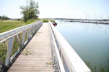 Obraz premium Madine lake sails boats port 