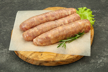 Raw pork meat sausages for grill