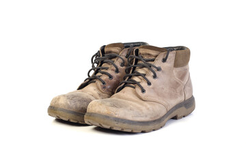 Old leather work boots. Isolated objects on a white background