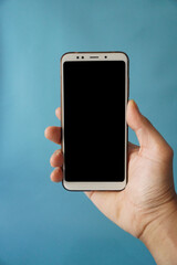 Right hand with blank smartphone