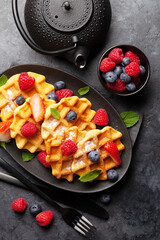 Delicious belgian waffles with summer berries