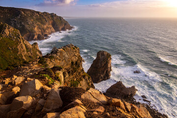 waves crashing on rocks