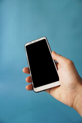 Right hand with blank smartphone