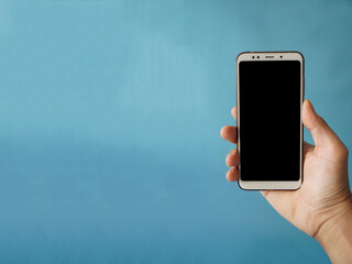 Right hand with blank smartphone