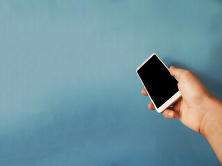 Right hand with blank smartphone